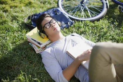 A picture showing a man resting on a field. ©Getty Images 